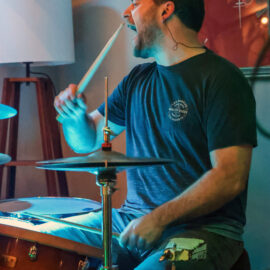 Edd pounding the drums at Rude Giant Bar, Brown Street